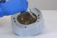 Rotocasting a metallic sphere